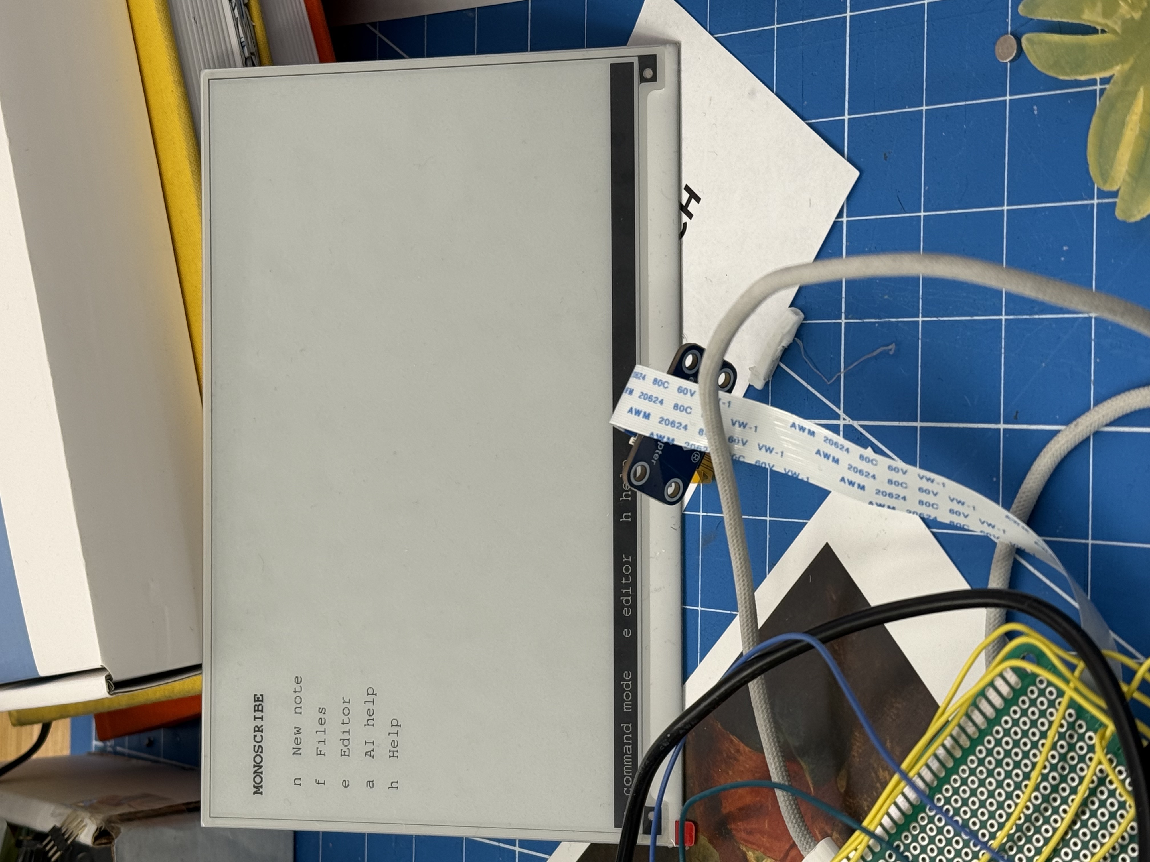 MonoScribe command interface running on an exposed E-Ink display during keyboard navigation testing